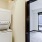 a small kitchen with a large white machine