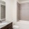 a bathroom with a marble countertop
