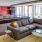 a large living room with a large couch and a coffee table
