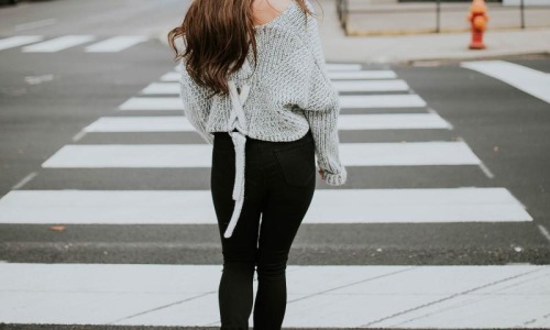 a person walking in a crosswalk