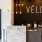 a counter with a sign above it