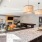 a kitchen with a marble counter