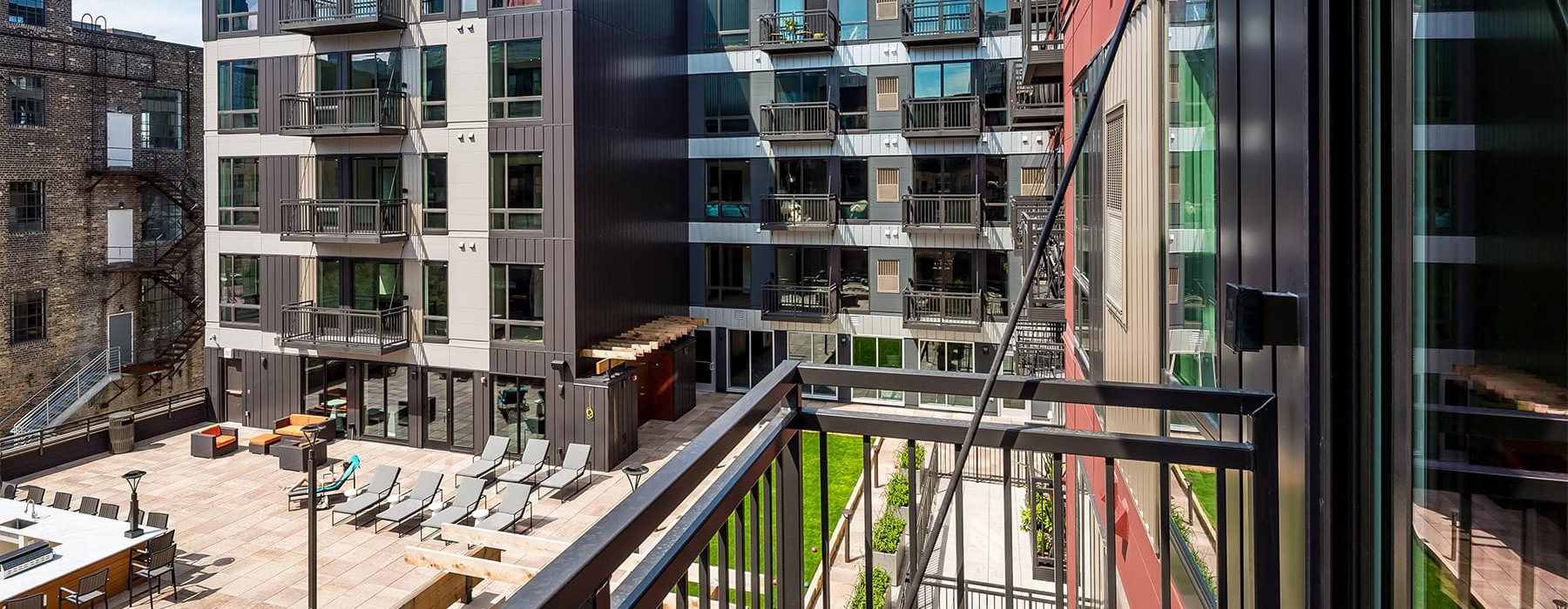 Exterior view of Velo Minneapolis apartment building with balconies